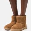 Ugg Classic Mini Logo Zip - Korte Laarzen - Chestnut