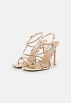 Steve Madden Implicit - Sandalen Met Hoge Hak - Gold 10 Steve Madden Implicit - Sandalen Met Hoge Hak - Gold -Dameskleding bf3ca453b0184f97aae795f92b034ca0